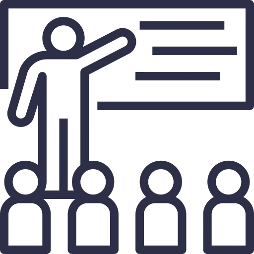 Icono de formador impartiendo formación presencial a un grupo de alumnos en aula